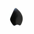 Black Bian stone gua sha on a white background