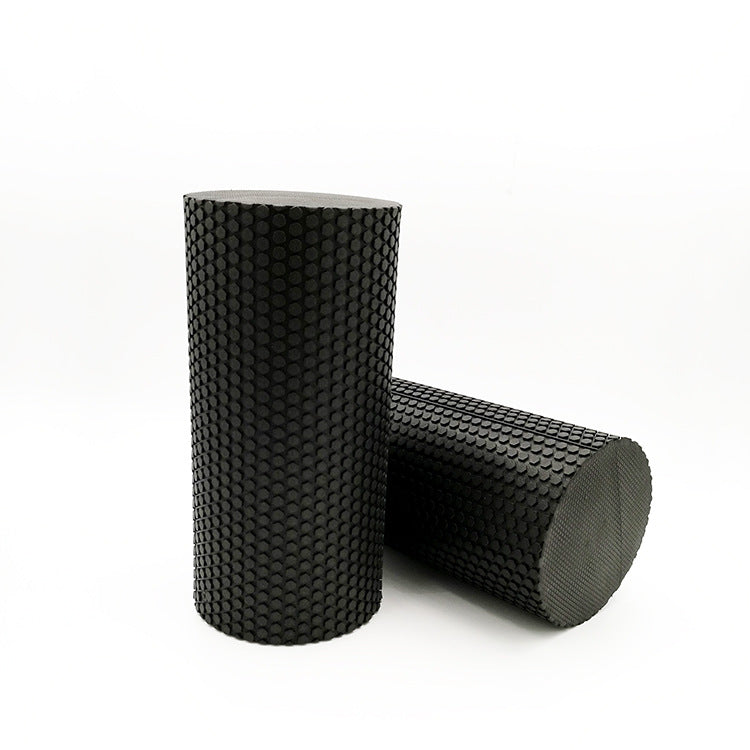 Two black textured foam rollers