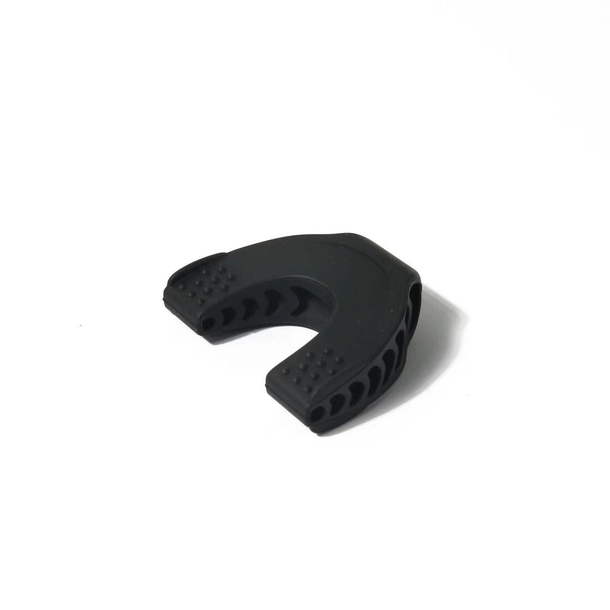 Black Skelgear U-shaped jaw trainer on a white background